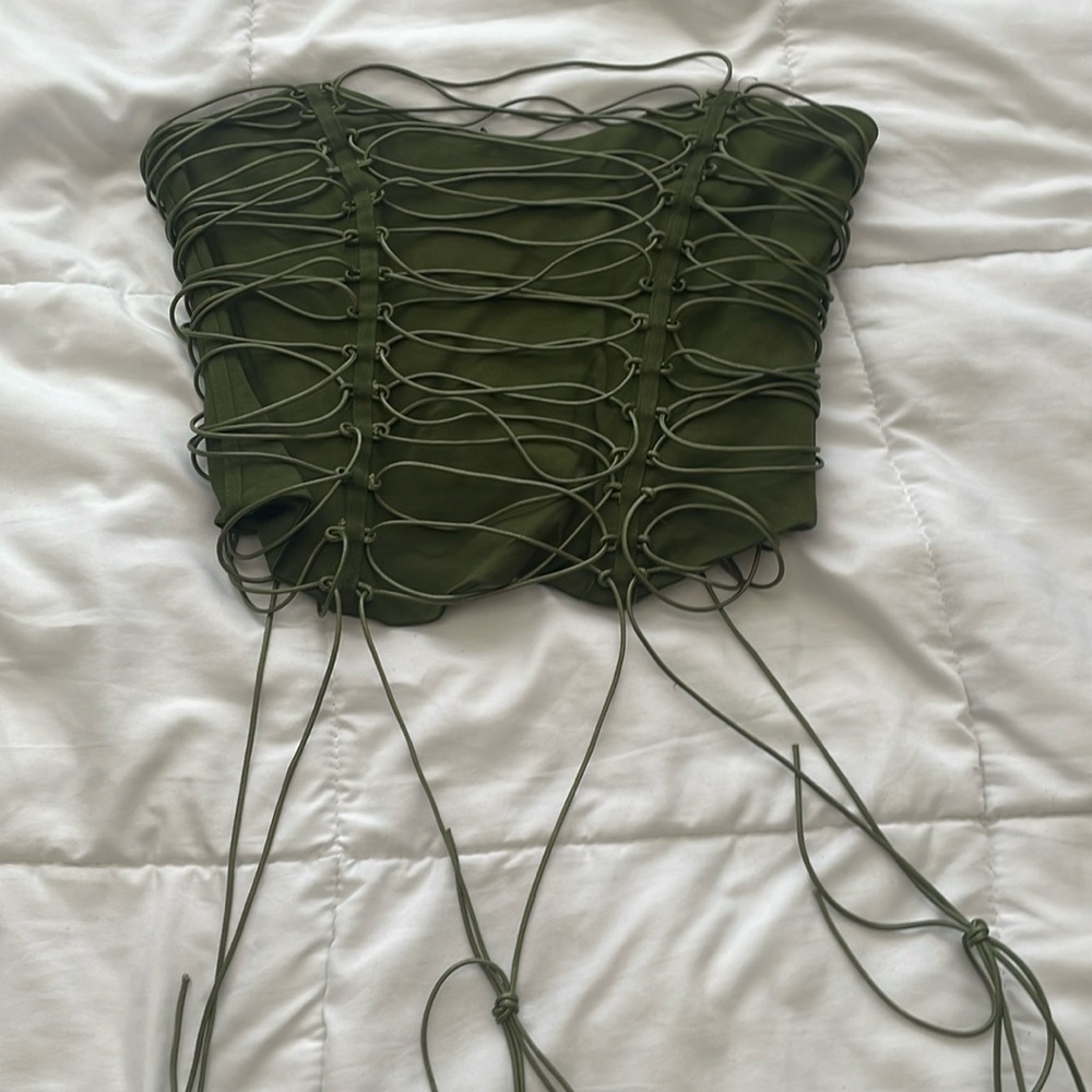 Strappy green corset top